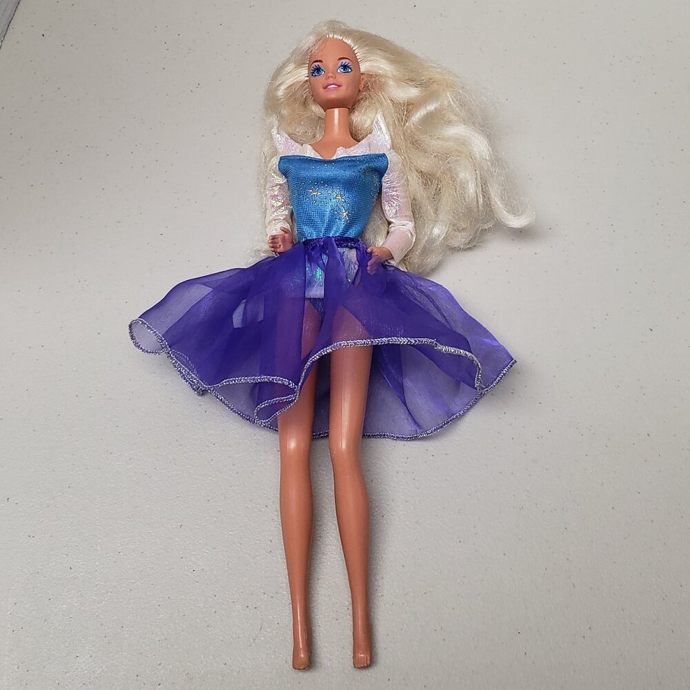 Vintage Barbie Doll (Redressed. Blue body suit, purple skirt)